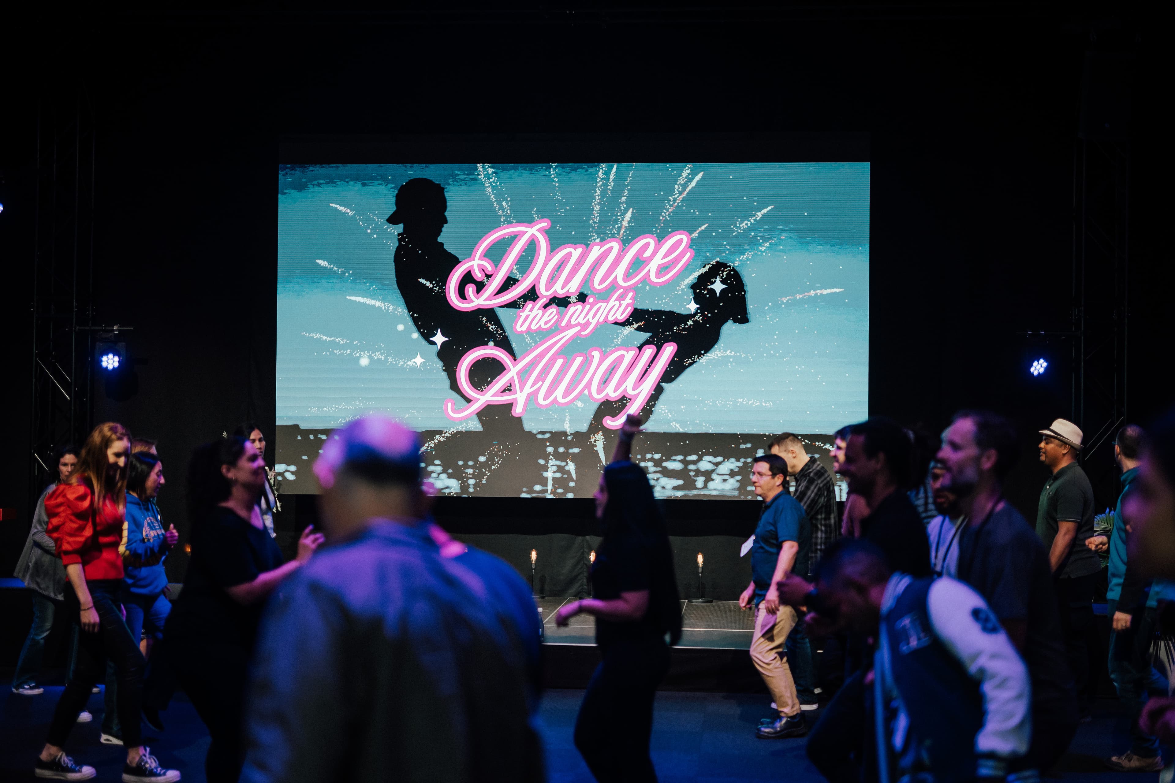 Couples dancing at marriage retreat