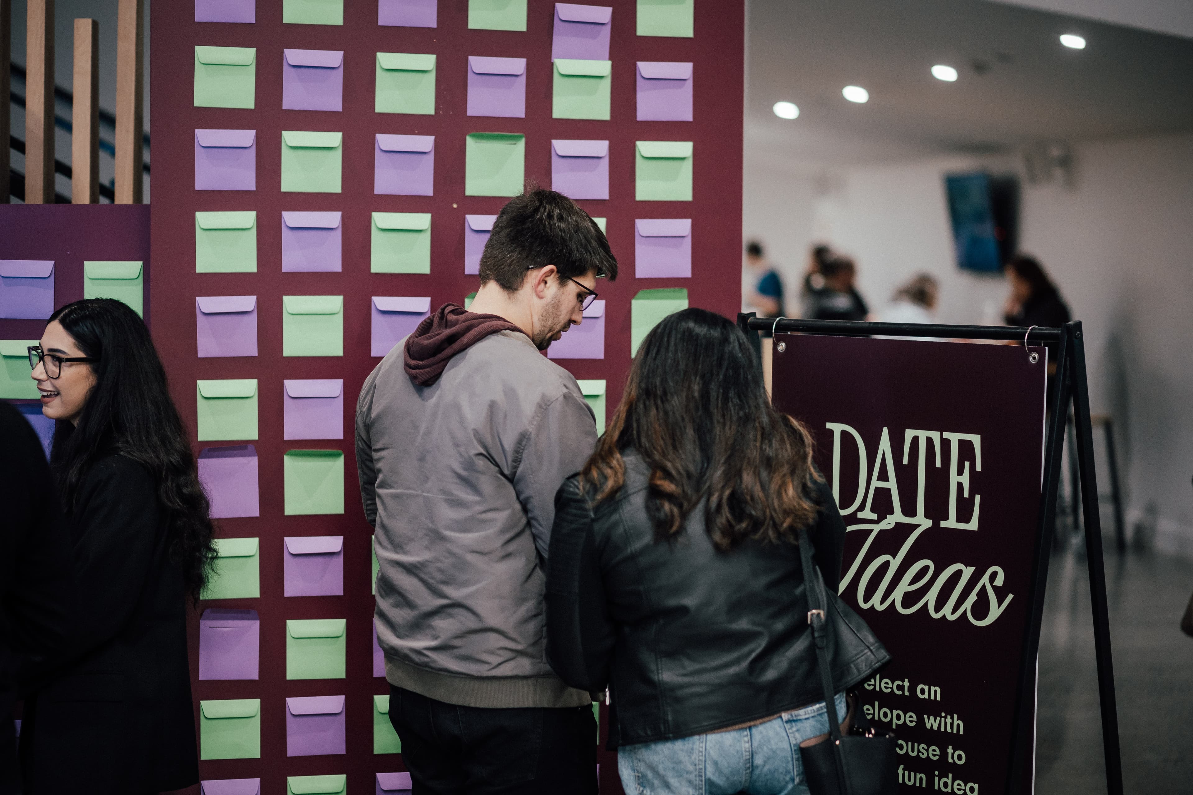 Couple at the Date Ideas stand at Together Forever