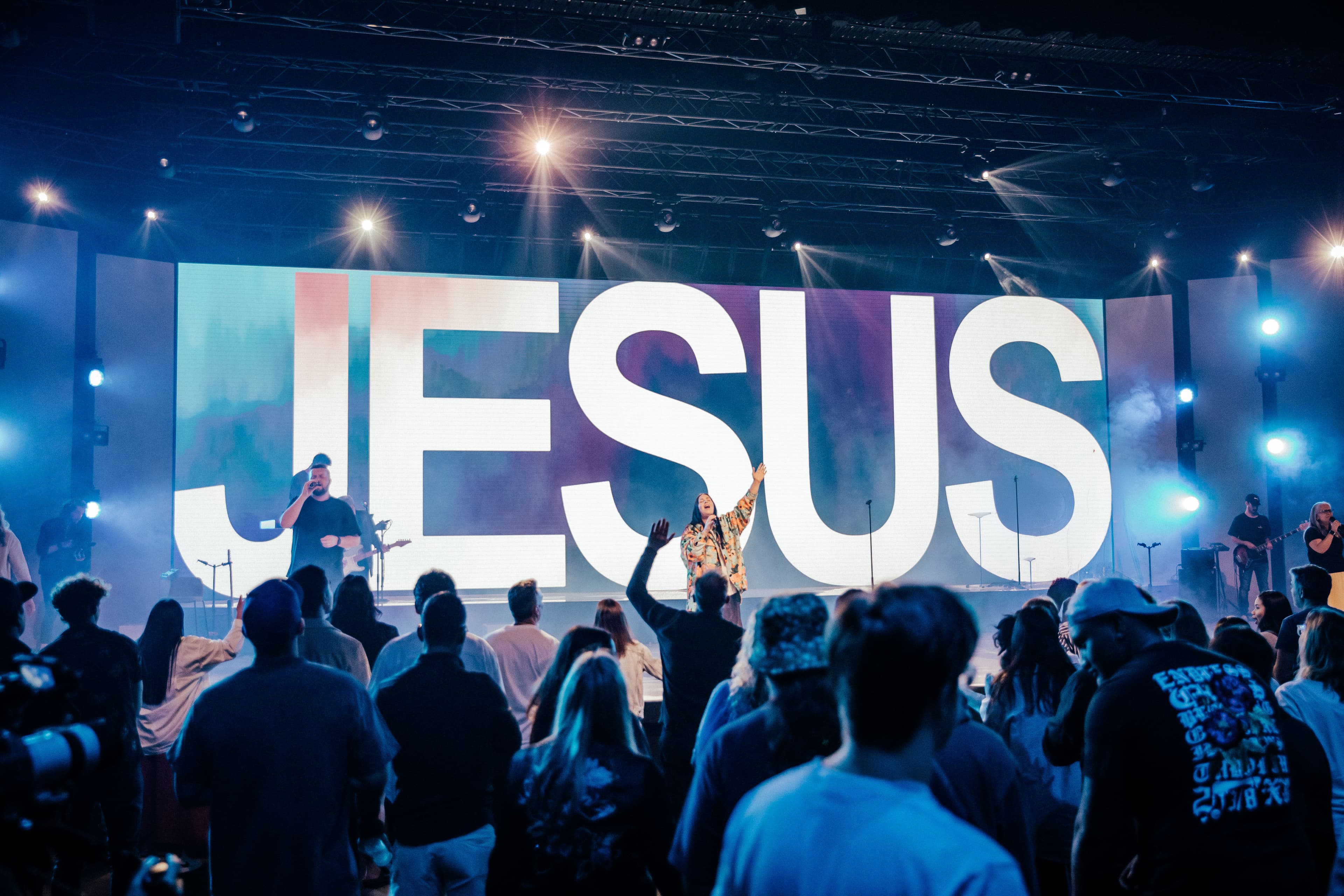 The words 'Jesus' displayed on screen during worship at LIFE Church Central Campus