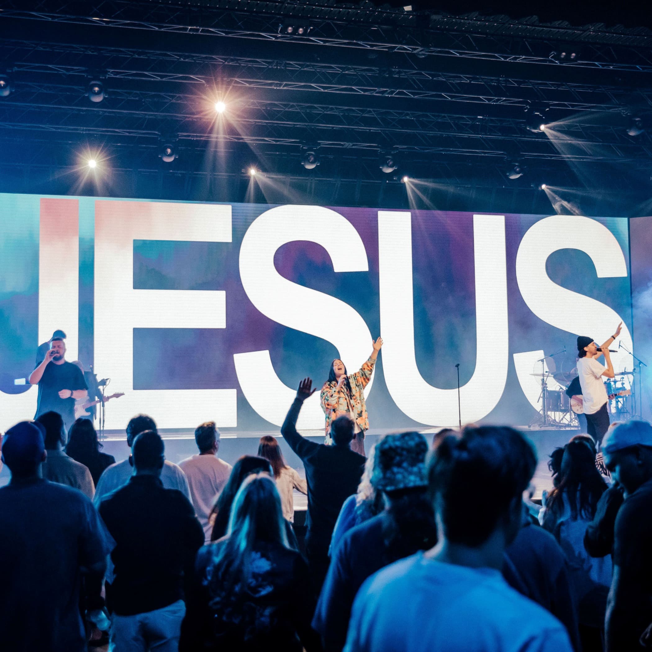 The words 'Jesus' displayed on screen during worship at LIFE Church Central Campus