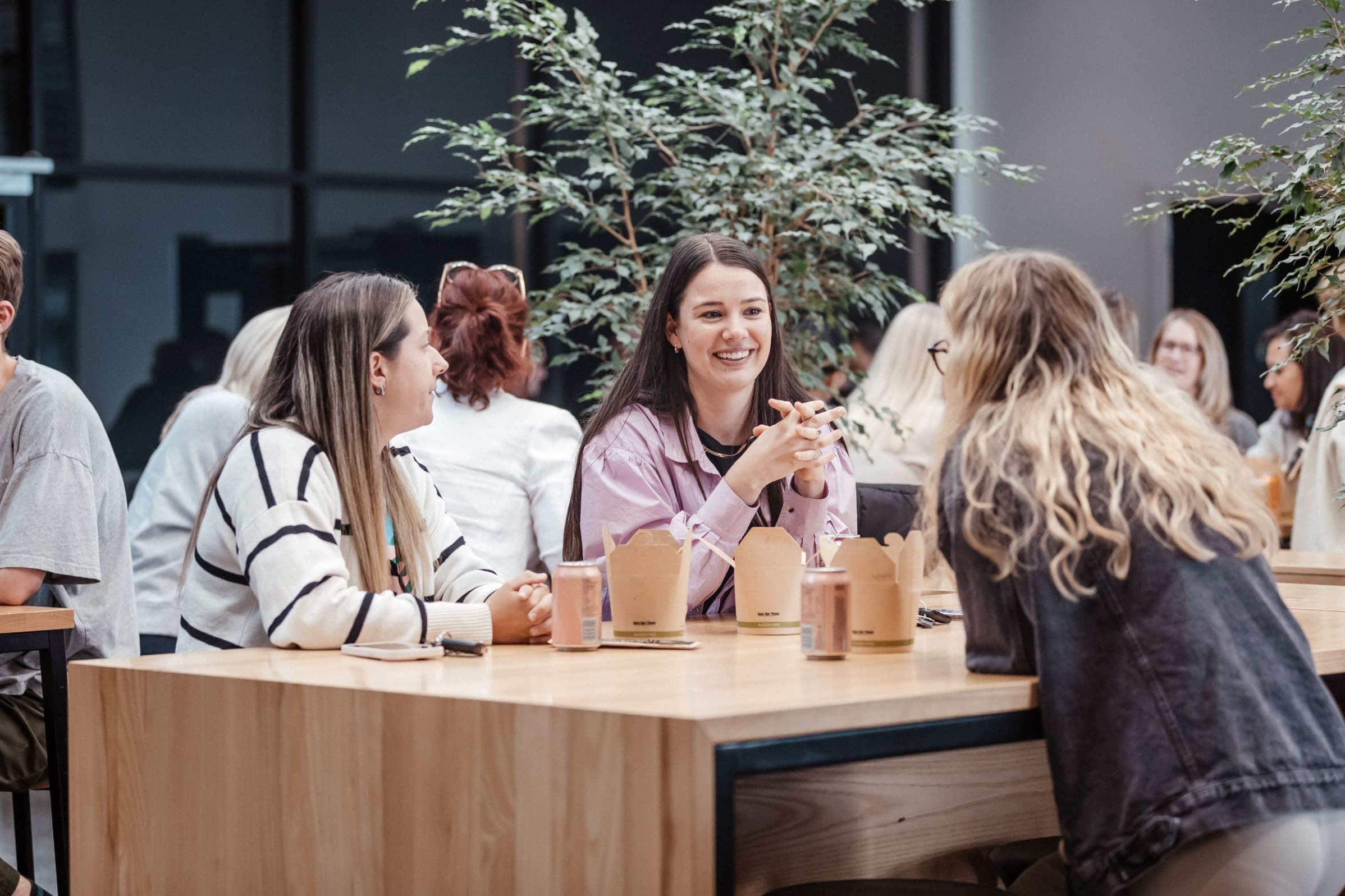 Staff chatting over a cup of coffee
